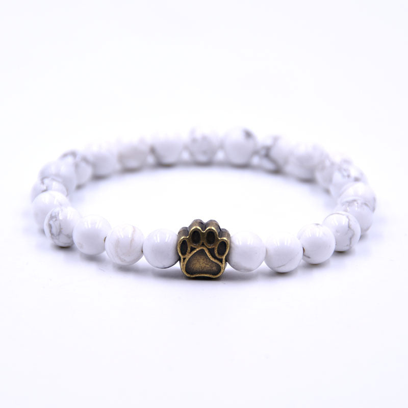 Snow Paw Bracelet — howlite, gold paw charm