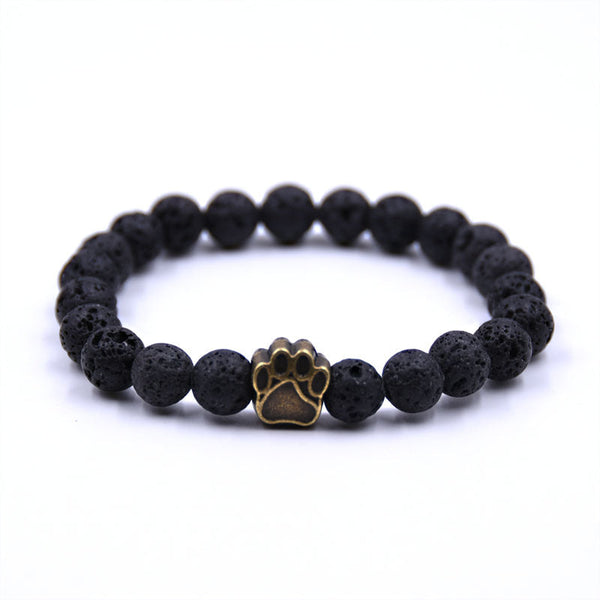 Midnight Paw Bracelet — lava stone, gold paw charm